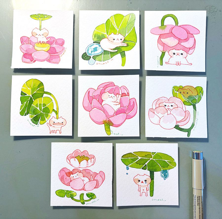 cats in lotus flowers ans leaves. 