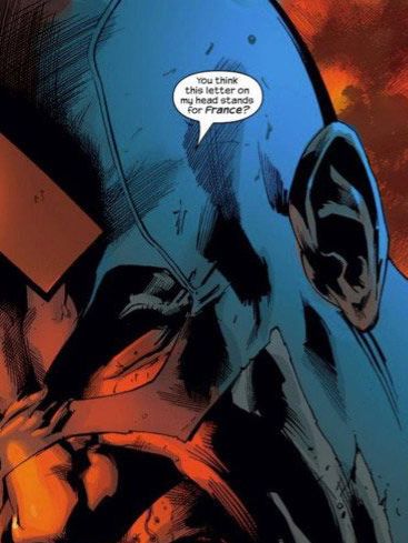 A bloody cap pointing at the A on his head and saying “Do you think the letter on my head stands for FRANCE?”