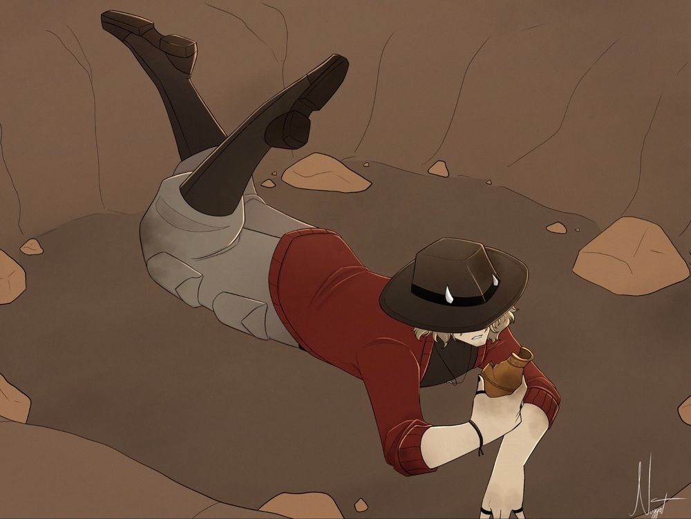 Jack laying on his stomach in a trench. His hat is covering most of his face as he looks at a broken pot he dug up