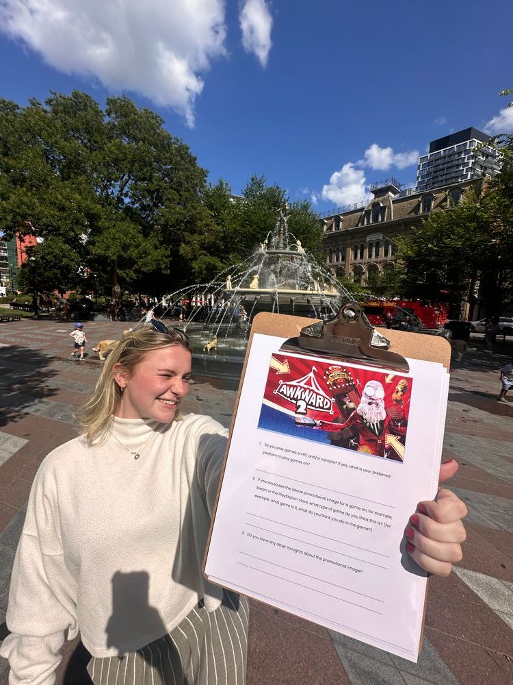 Flo holding out clipboard with a survey sheet with key art and questions for the video game "Awkward 2". Behind her is a fountain.