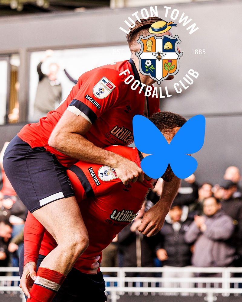 Reece Burke (with the Luton Town logo over his face) jumping on Carlton Morris (with the Bluesky logo over his face).