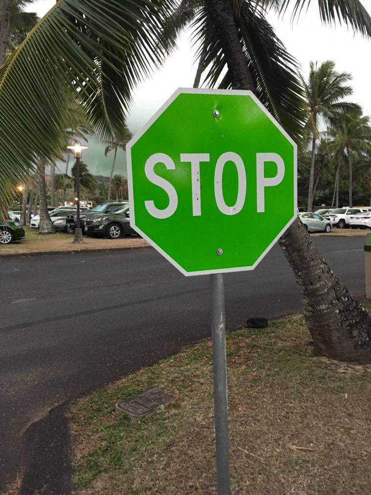 a stop sign that’s green instead of red