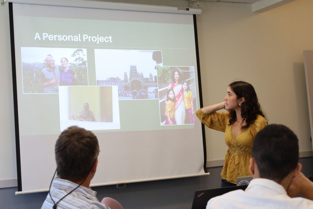 A student presents in front of a screen reading: "A Personal Project"