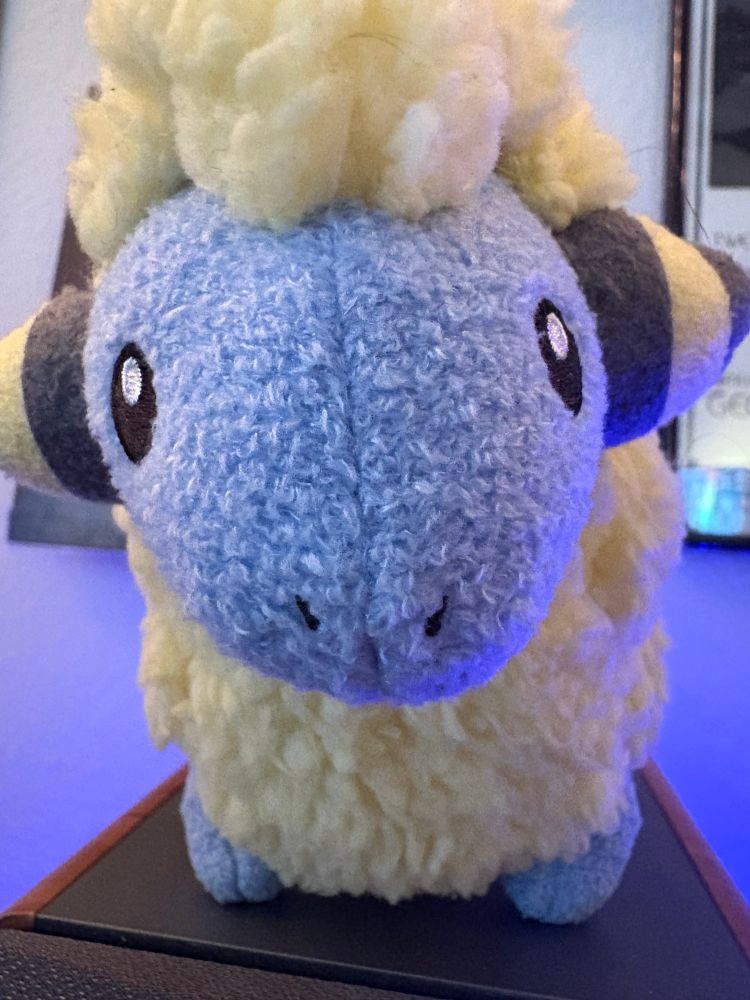 Staring fuzzy Mareep plush