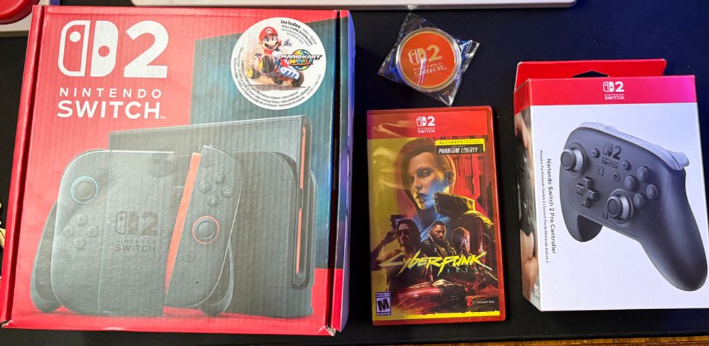 Switch 2, pro controller, pin, and cyberpunk
