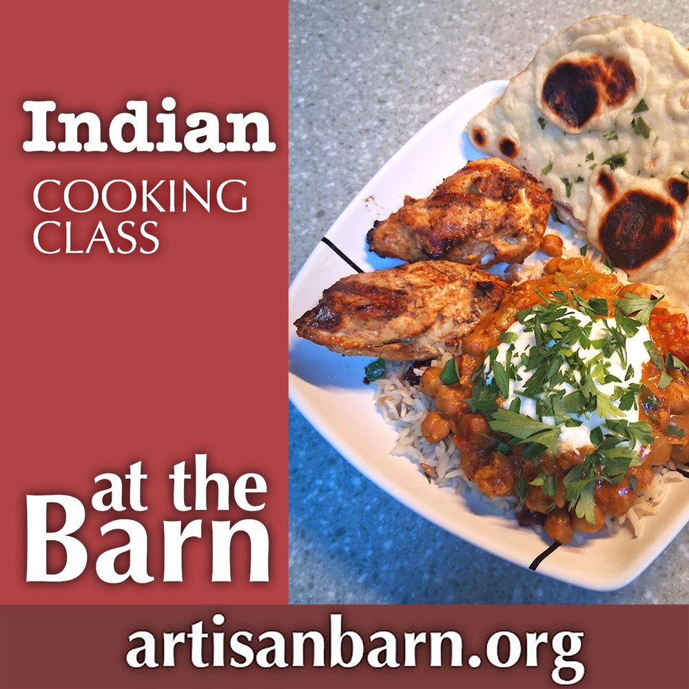 Serving of naan, tandoori chicken Tikka, butter chickpeas over savory rice, with a dollup of yogurt, sprinkled with cilantro.