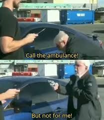 Panel 1: Old man being mugged, bending over next to his car while a younger man points knife at him. He says, "Call the ambulance!"

Panel 2: The old man stands up, pulling a gun on his assailant, and says "But not for me!"