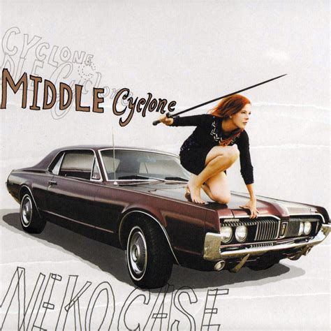 Cover of Middle Cyclone with musician Neko Case crouched on the hood of her 1967 Mercury Cougar holding a sword. 