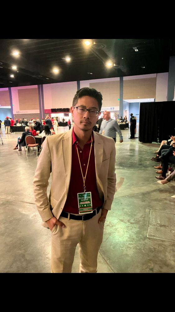 Me in a tan suit and red shirt at the trump election watch party 2024 in palm beach Florida 