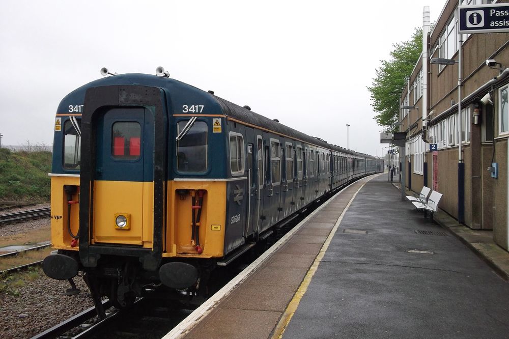4VEP electric multiple unit 3417 ‘Gordon Pettit’ in P3 at Eastleigh. The unit is in the original blue with aluminium window frames, half yellow ends, red blinds
Class 73 73213 hauling to Swanage Gala, in GBRF livery