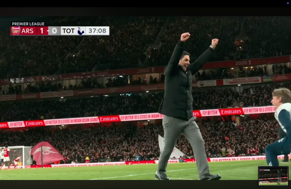 Mikel Arteta celebrating a goal vs Spurs.