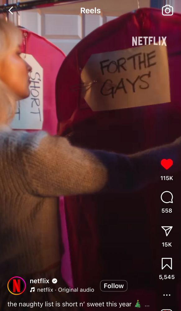 screenshot of a netflix instagram reel promoting the special “a nonsense christmas with sabrina carpenter.” picture shows sabrina looking at a red garment bag with a note saying “for the gays” in all caps.
