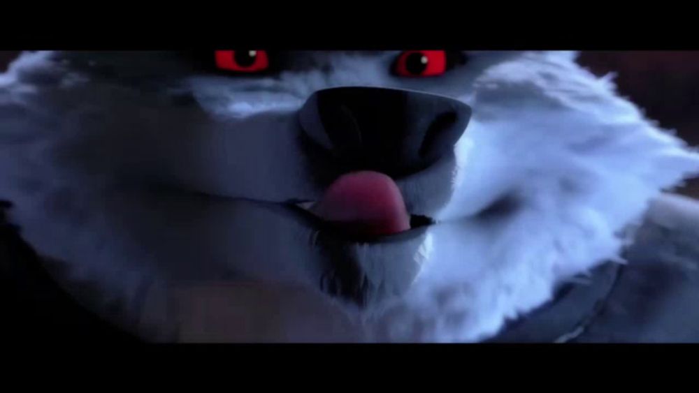 a close up of a furry animal with red eyes