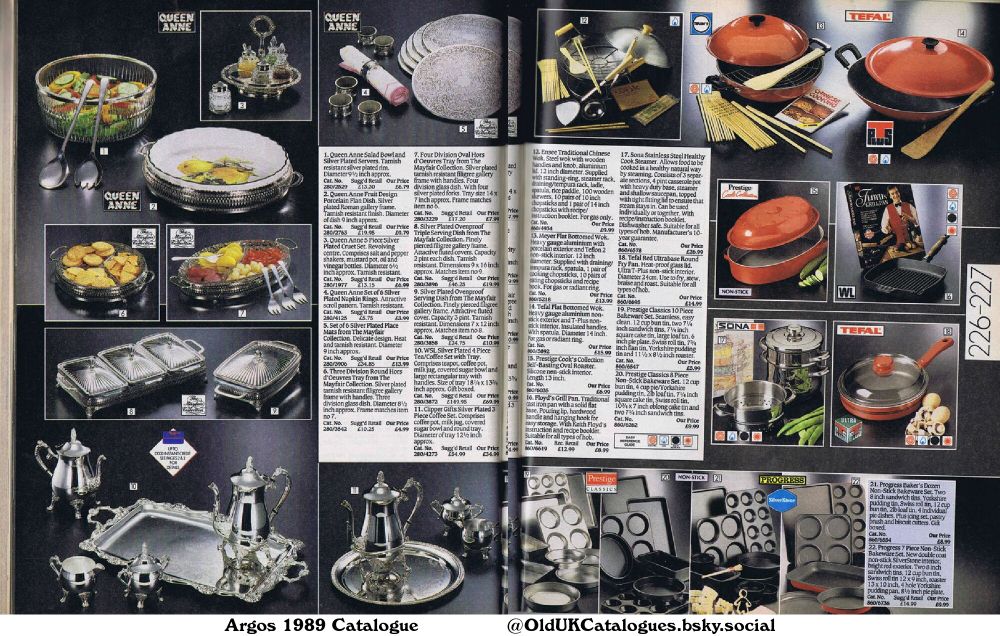 This page is from a catalogue featuring kitchenware and bakeware. The items are grouped into sets and individual pieces, with prices and catalogue numbers provided. It includes silver-plated serving dishes, bakeware, woks, and cookware from various brands such as Queen Anne, Prestige, and Tefal.

(+Clipper Gifts Silver Plated 3 Piece Coffee Set
Ensee Traditional Chinese Wok
Floyd's Grill Pan
Four Division Oval Hors d'Oeuvres Tray
Meyer Flat Bottomed Wok
Prestige Classics 10 Piece Bakeware Set
Prestige Classics 8 Piece Non-Stick Bakeware Set
Prestige Cook's Collection Self-Basting Oval Roaster
Progress 7 Piece Non-Stick Bakeware Set
Progress Baker's Dozen Non-Stick Bakeware Set
Queen Anne 5 Piece Silver Plated Cruet Set
Queen Anne Fruit Design Porcelain Flan Dish
Queen Anne Salad Bowland Silver Plated Servers
Queen Anne Set of 6 Silver Plated Napkin Rings
Set of 6 Silver Plated Place Mats
Silver Plated Ovenproof Serving Dish
Silver Plated Ovenproof Triple Serving Dish
Sona Stainless Steel Healthy Cook Steamer
Tefal Flat Bottomed Wok
Tefal Red Ultrabase Round Fry Pan
Three Division Round Hors d'Oeuvres Tray
and WSL Silver Plated 4 Piece Tea/Coffee Set with Tray)