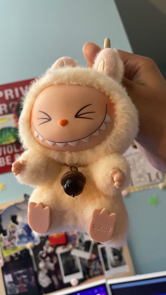 Labubu with acorn necklace