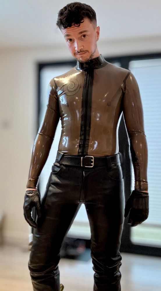 Me in leather trousers and gloves, with a transparent smokey rubber top.