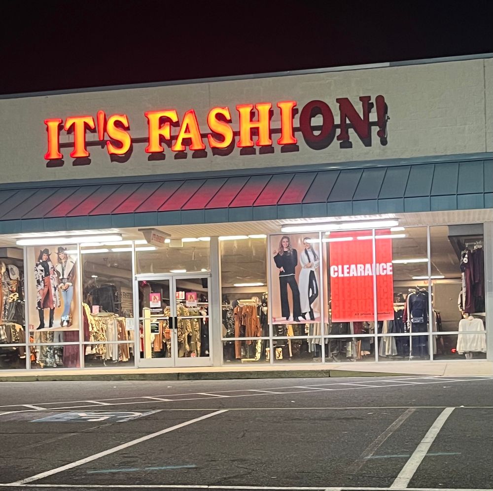 The facade of a store in a Delaware strip mall called its fashion but the lights on the o n and exclamation point are out so it says it’s fashi 
