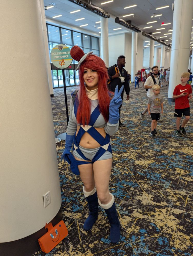 A cosplay of Skyla from Pokemon Black and White
