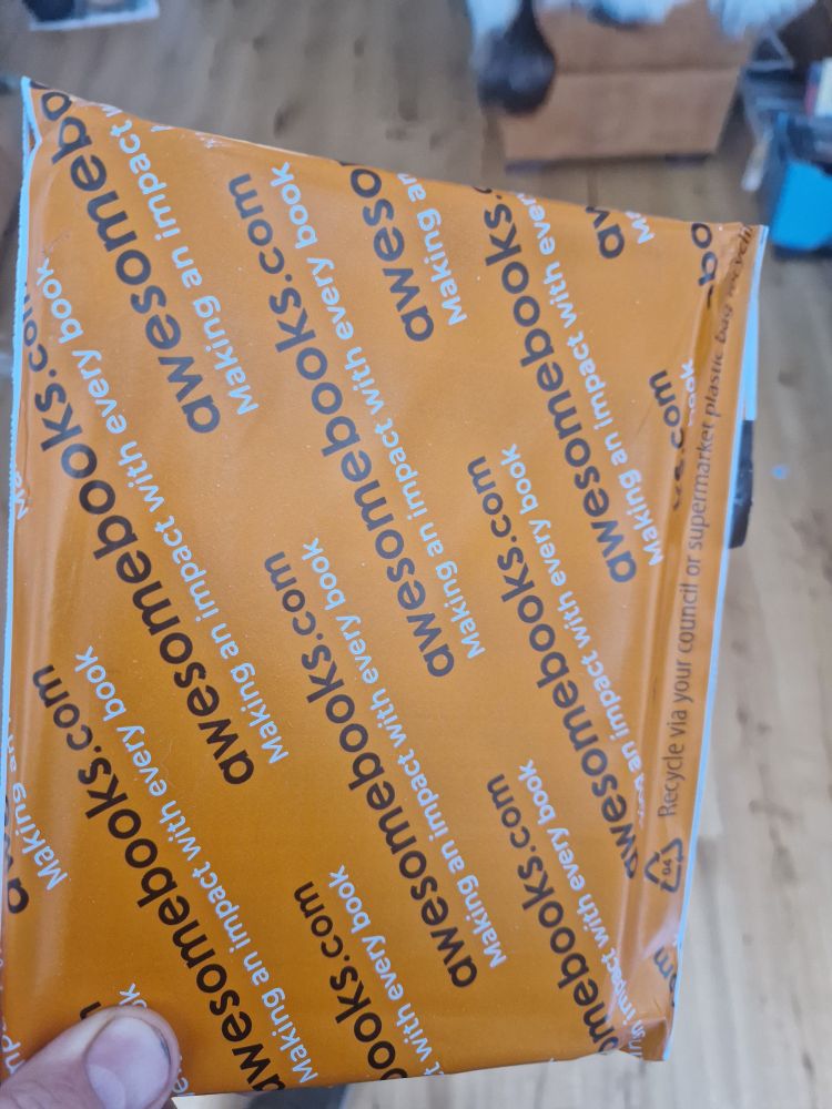 A World of Books envelope with a copy of O'Brian's Golden Shore inside.