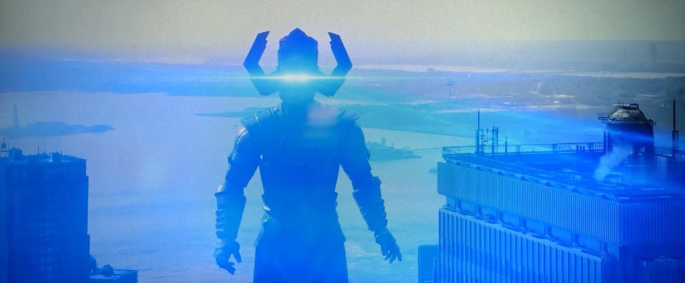 Galactus standing at the edge of NYC with blue laser eyes, searching for Franklin. Or maybe Klondike Bars.