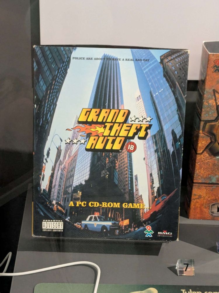An original big box version of the first Grand Theft Auto game, released in 1997 featuring a fish eye photograph of skyscrapers 