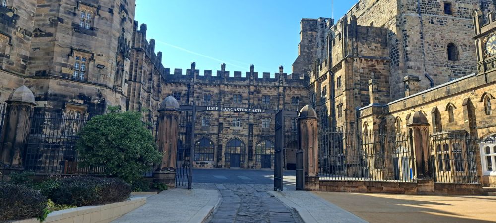 View through the 'HMP Lancaster Castle' gate at Lancaster Castle