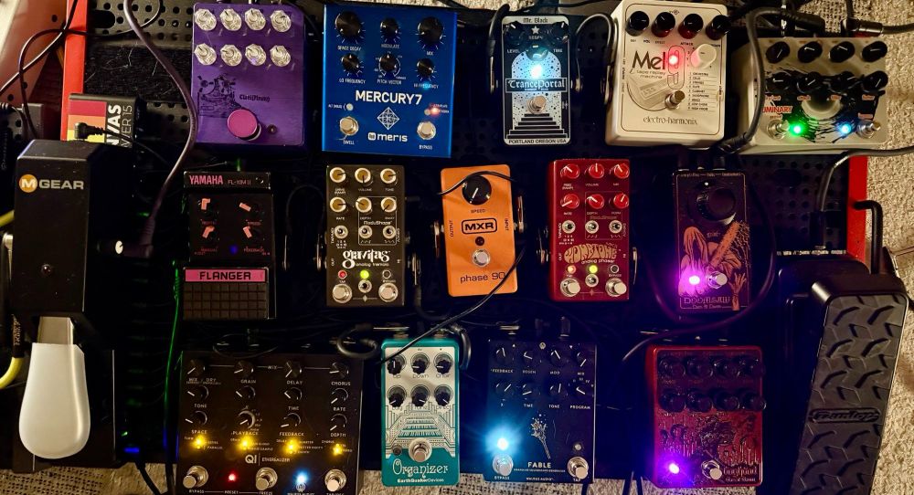 An electric guitar pedal board.