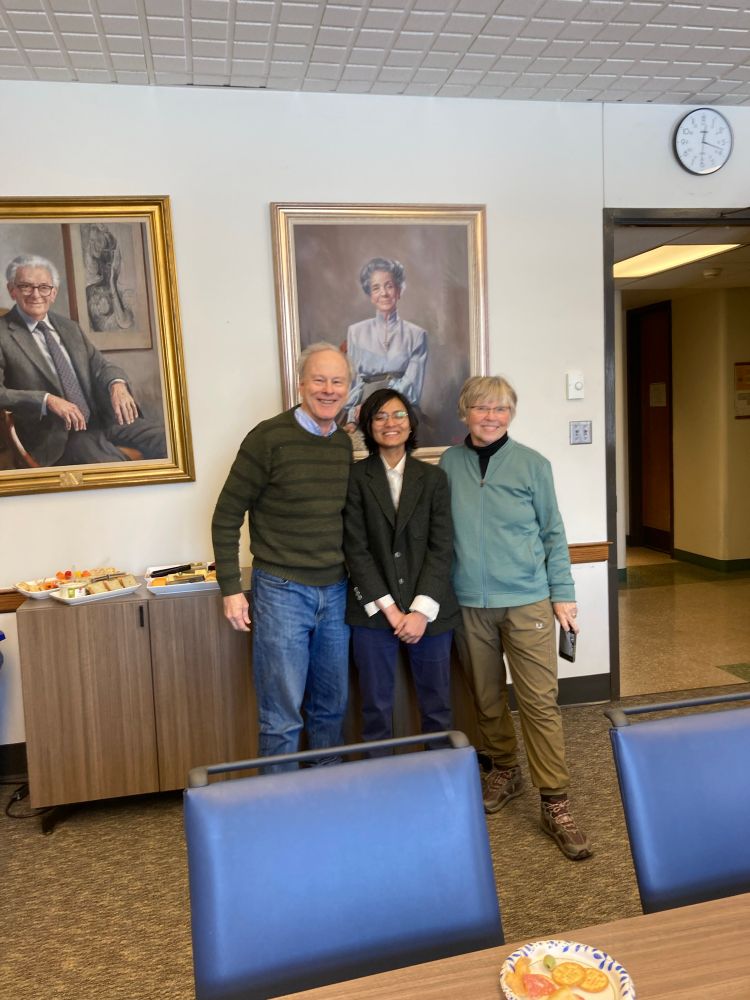 Israt standing in the middle with her advisors Joan Strassmann on the left and David Queller on the right. The photo was taken at her thesis defense celebration.