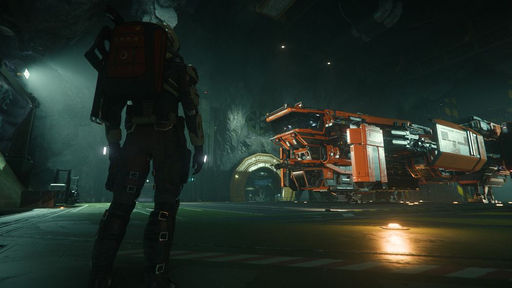 Standing in one of Levski's many asteroid hangars, TekkerTen regards the shiny orange hull of his ARGO Multi-Operator Laser Extractor.