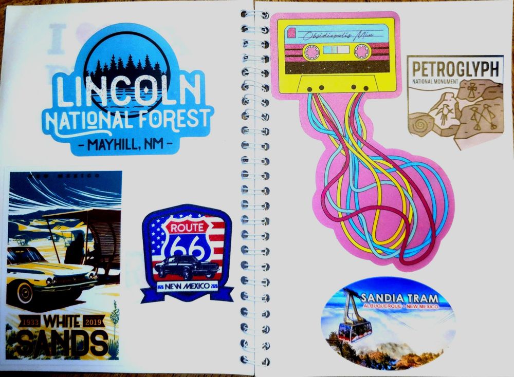 Stickers front 
Lincoln National Forrest 
White Sands National Park
Route 66 New Mexico 
Santa Fe Meow Wolf 
Petroglyph's National Monument 
Sandia Tram 