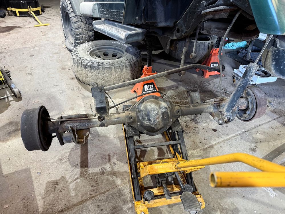 Jeep wrangler differential on a transmission jack. The differential has been removed from the vehicle. 