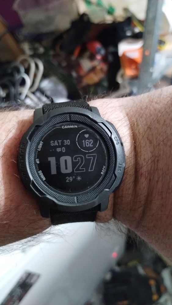 Garmin watch showing pulse rate of 162 bpm