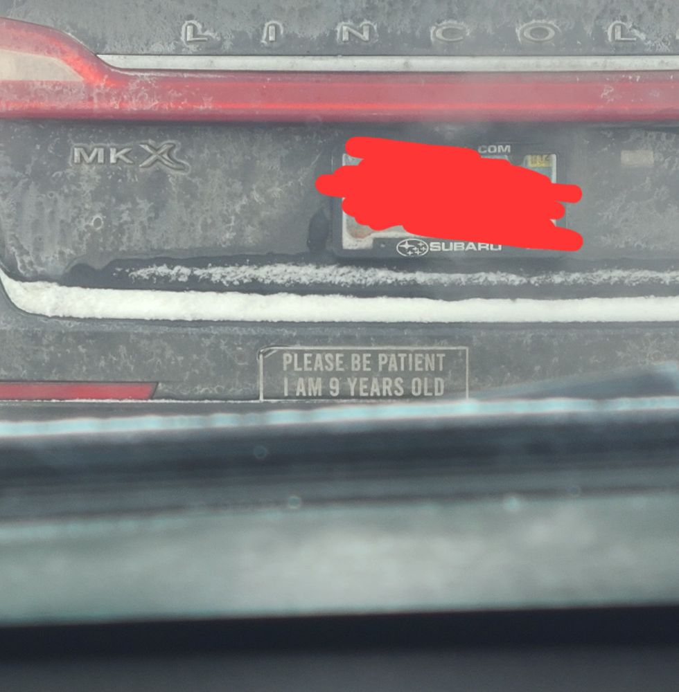 Bumper sticker that says "please be patient I am 9 years old"