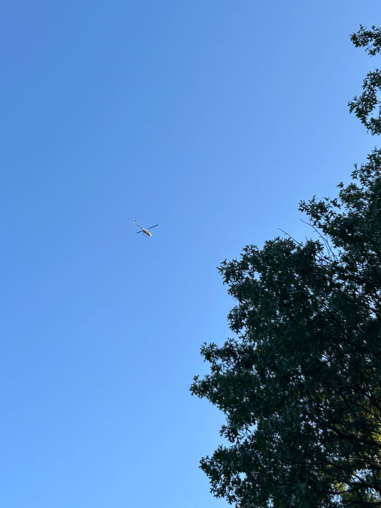 A helicopter circling.