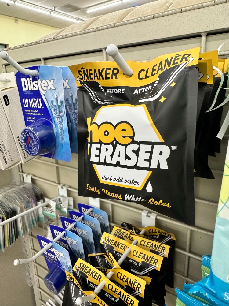 photo of a dollar tree sneaker cleaner called “shoe eraser” taken at an angle so it reads “hoe eraser”