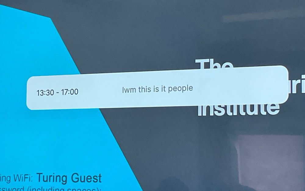 Meeting name in large screen reads: “LwM this is it people”