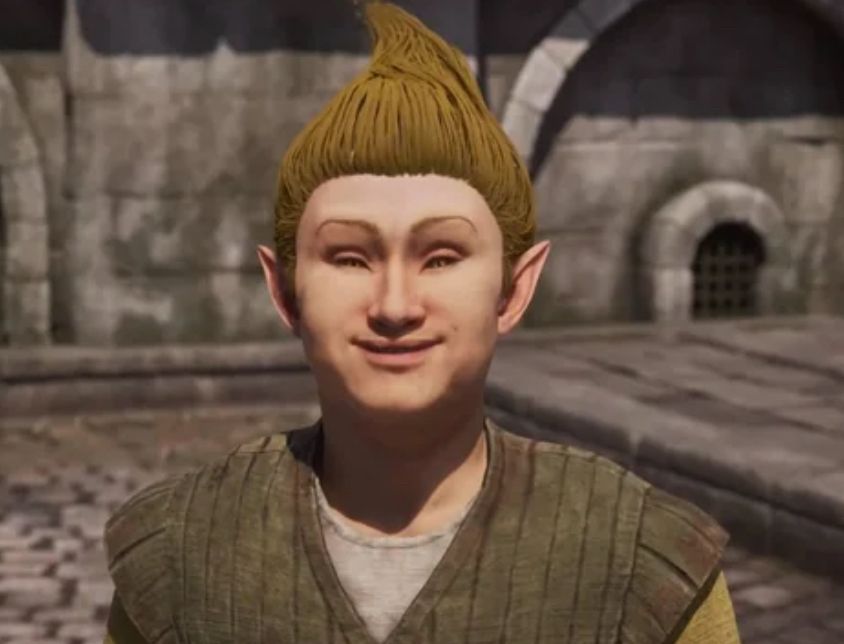 Screen capture from the remastered game Elder Scrolls Oblivion of a smiling elf with pale skin and blonde hair that looks improbably like the top of a creamy whip ice cream cone. 