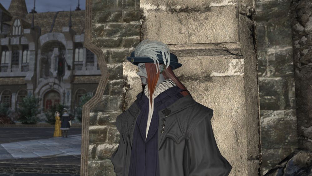 A duskwight elezen man watches not so distant nobles from behind a corner. 