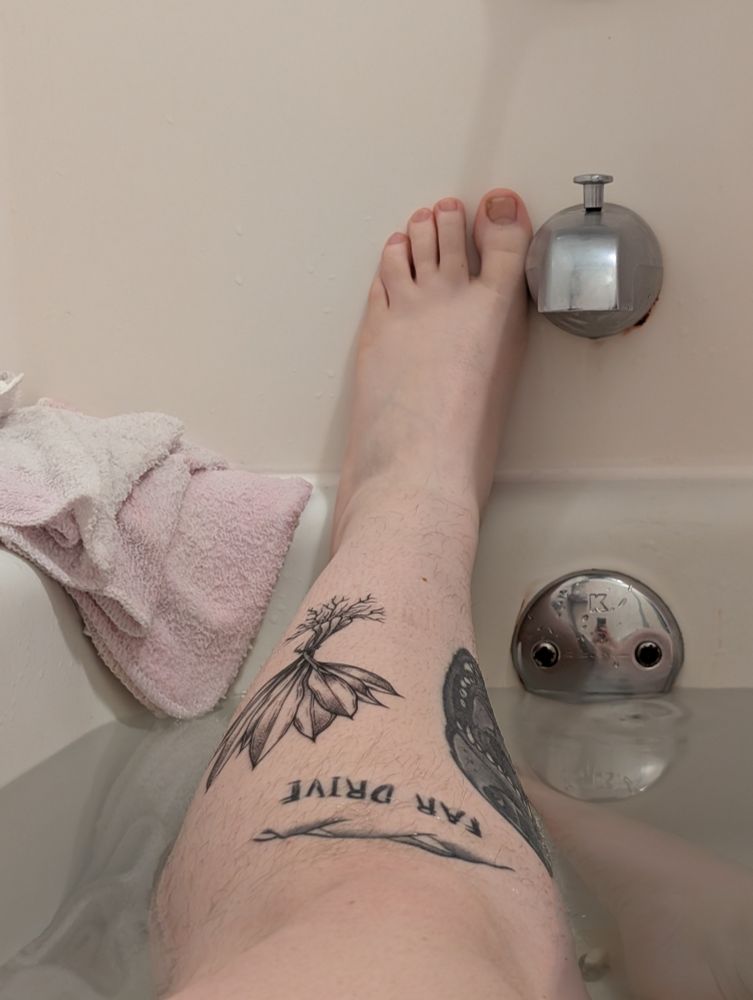 Me just barely keeping my tattoo out of the bath also enjoy the free foot pic