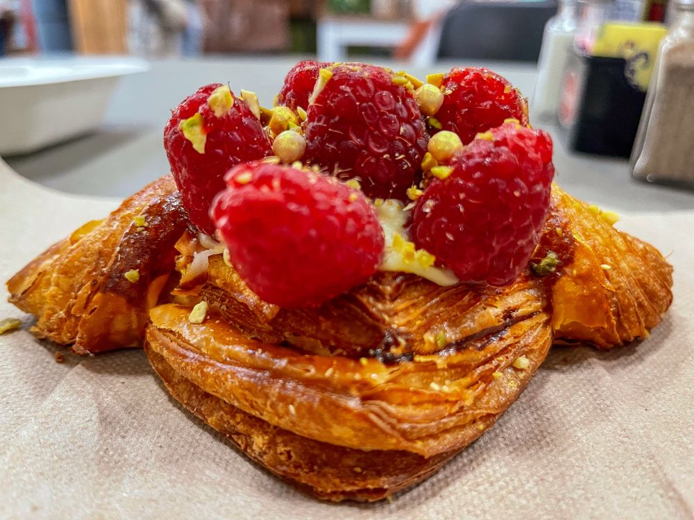 Diamond croissants with raspberries at the MS Farmers Market from Just Vanilla Bakery, Jackson MS. Get here by 9 or they’re out.