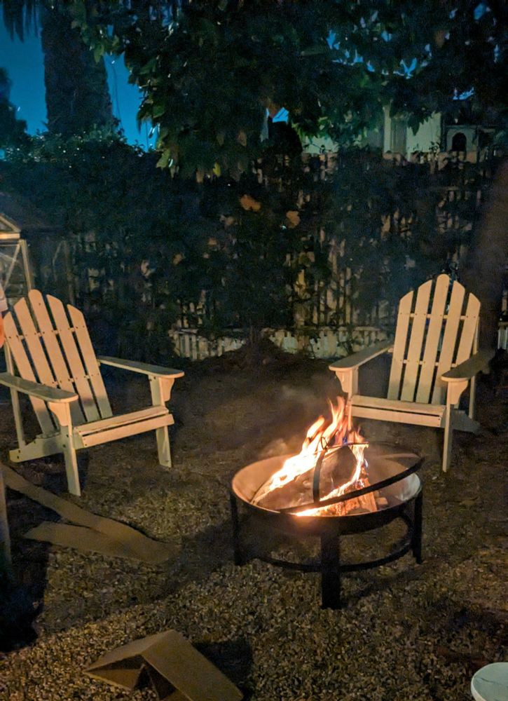 campfire with two chairs