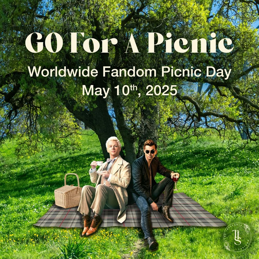 Aziraphale and Crowley on a tartan picnic blanket in a green field under a large tree. White text says "GO For A Picnic. Worldwide fandom picnic day. May 10th, 2025". The watermark symbol for The Ineffable Society is in the corner.