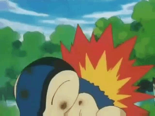 a close up of a cartoon character with a red and yellow explosion on its head .