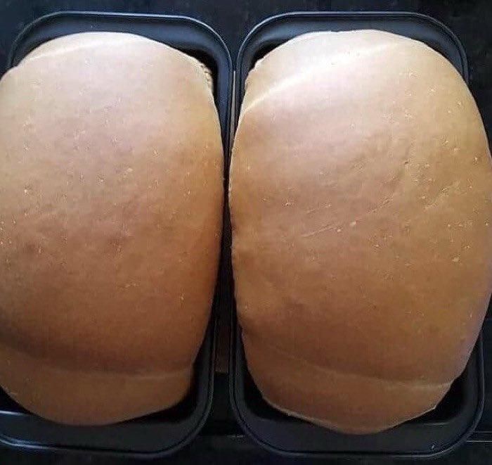 Two bread loaves that together appear to be an ass in a thong. 