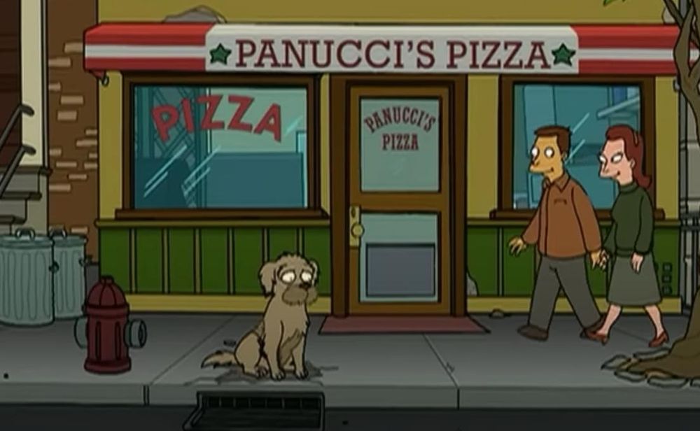 A still from Futurama where a sad waits by Panucci's Pizza 