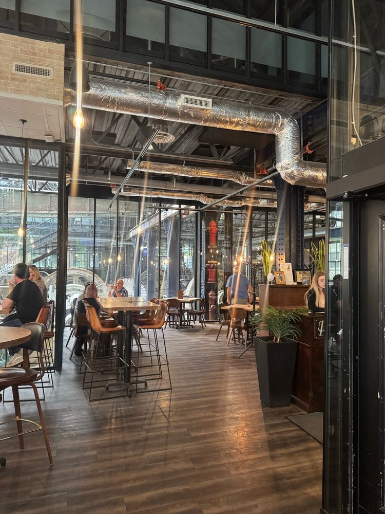 The inside of a restaurant that used to be a place where firefighters would pump water
