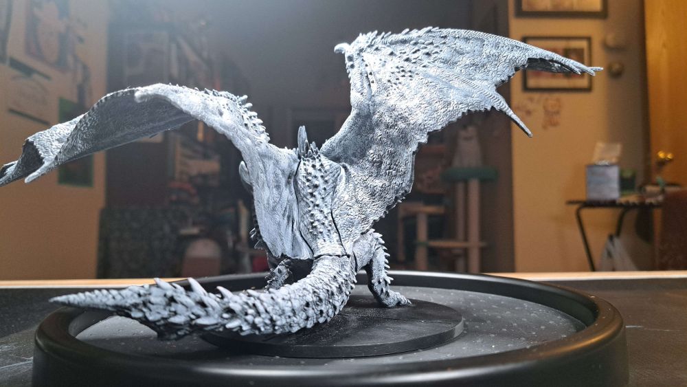 Turn around of Nergigante from the Monster Hunter World Board Game with a base coat and white dry brush.