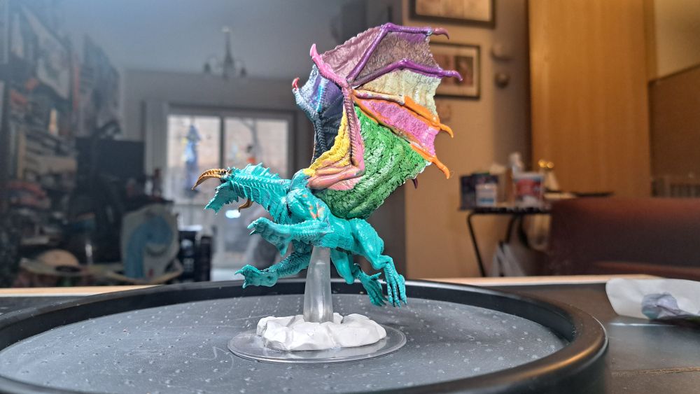 A colorful "black dragon" painted by my daughter. WIP