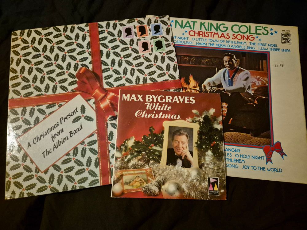 Christmas records by The Albion Band, Max Bygraves and Nat King Cole.