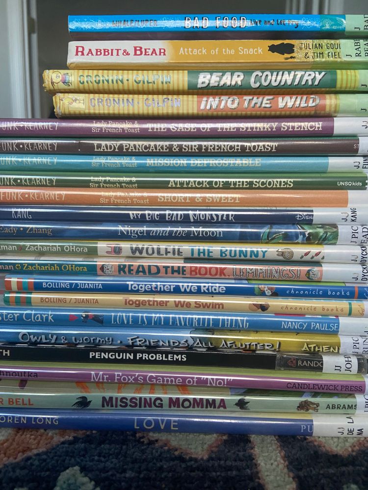 Stack of picture book titles.